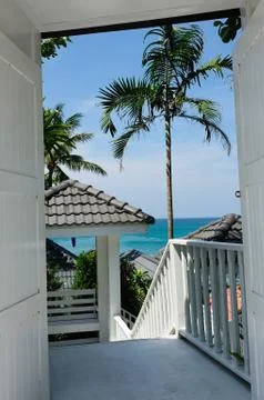 Beach landscape through the door Stock Photos