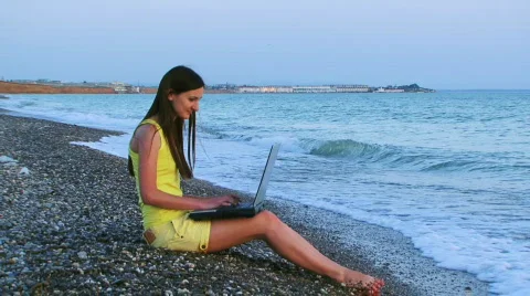 On the beach with a laptop Stock Footage 735586