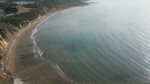 A beach with a large body of water in the background Stock Footage 298272572