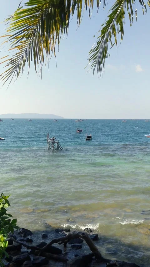Beach on Lemukutan Island with a mountain backdrop Stock Footage 312661704
