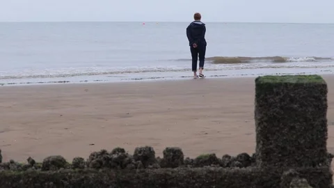 Beach life fun on the sand playing in the low tide adults and children Video stock 137578712