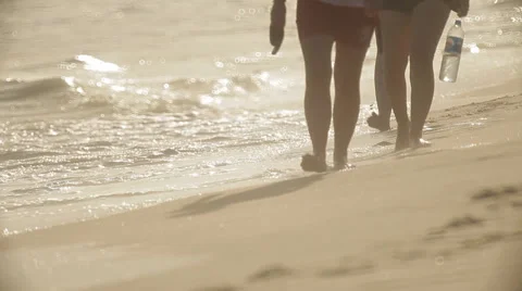 Beach life. People are walking along the beach. Waves, surf. Video stock 45280774