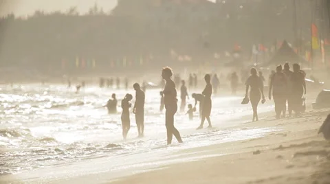 Beach life. People are walking along the beach, having fun. Wave, surf. Stock Footage 45281069