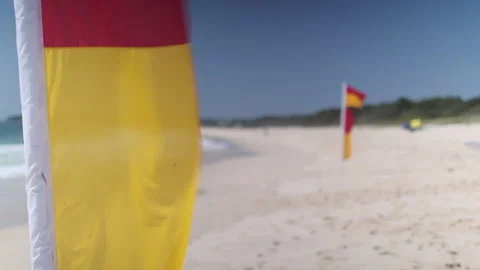 Beach with Lifeguard Flags CU (pull focus) Video stock 170344394