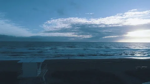 Beach lifeguard stand w/ walker Stock Footage 103736973