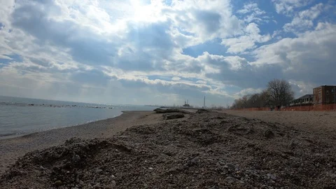 Beach with lifeguard station in the background. Stock Footage 104919865
