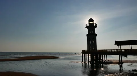 A Beach With Lighthouse At Day Light Stock Footage 50795060