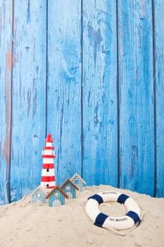 Beach with lighthouse Stock Photos