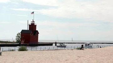 Beach with Lighthouse Static Shot Stock Footage 85571864