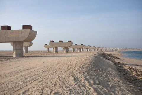 Beach line with concrete structures. Stock Photos