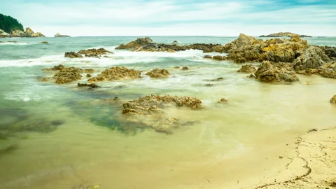 Beach with long exposure taken at time lapse Stock Footage 145703376