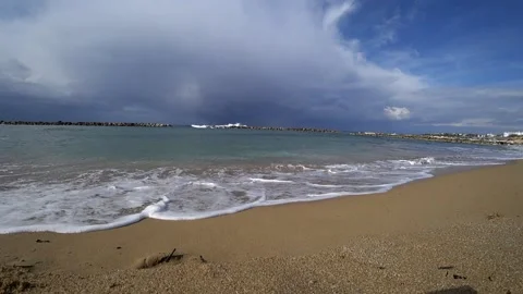 By the beach with a man running, slow motion Stock Footage 183990505