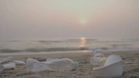 Beach in the morning with ocean garbage scene Stock Footage 237459718