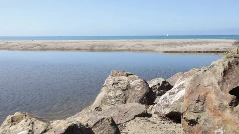 Beach Morning Pond - PANNING UP VERSION ONE Stock Footage 76914802