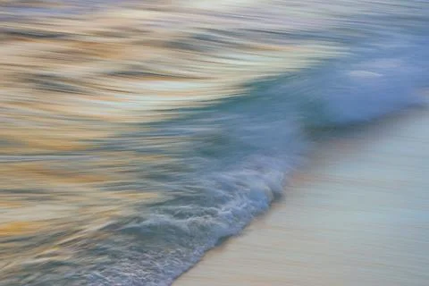 Beach with moving waves Stock Photos