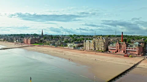 Beach next to Edinburgh features a promenade with historical buildings. Stock Footage 267540375