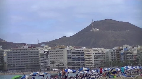 Beach next to the mountain in a windy day Stock Footage 80041910