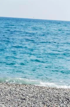 Beach of Nice with its pebbles Stock Photos