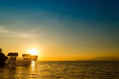 Beach nipa huts Stock Photos