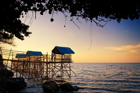 Beach nipa huts Stock Photos