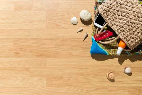 Beach objects on parquet flooring. Stock Photos