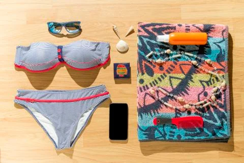 Beach objects on parquet flooring. Stock Photos