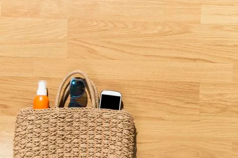 Beach objects on parquet flooring. Stock Photos