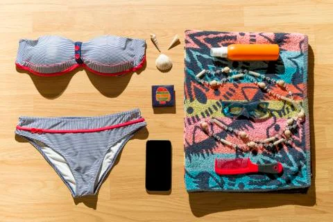 Beach objects on parquet flooring. Stock Photos