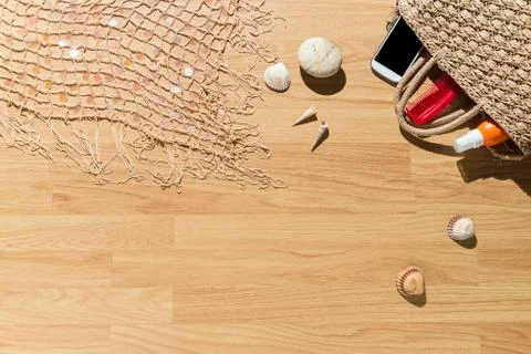 Beach objects on parquet flooring. Stock-Fotos