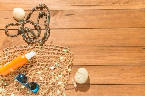 Beach objects on wooden boards. Stock Photos