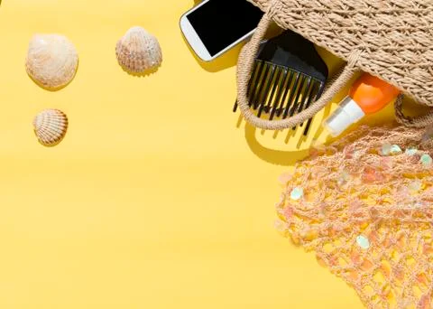 Beach objects on yellow background. Stock Photos