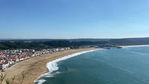 Beach on the ocean from above. Big waves on the ocean beach. Panorama of the Stock Footage 312750486