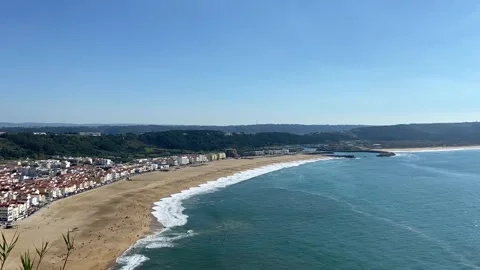 Beach on the ocean from above. Big waves on the ocean beach. Panorama of the Stock Footage 312803148