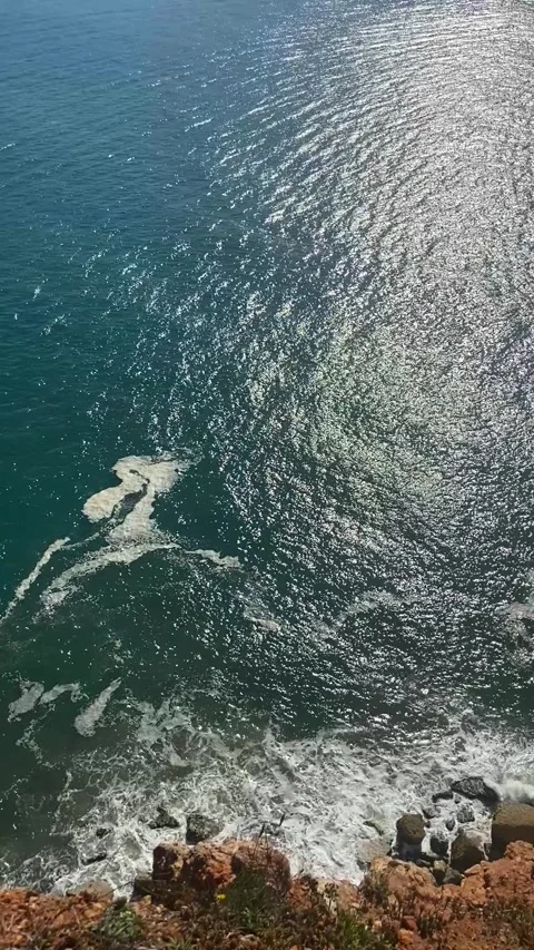 Beach on the ocean from above. Big waves on the ocean beach. Panorama of the Stock Footage 316398020