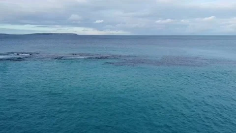 Beach to ocean aerial footage Stock Footage