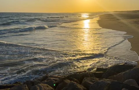 Beach Ocean Sunset Orange Sun Blue Clouds Sand Stock Photos