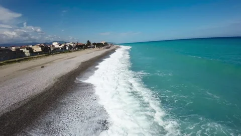 Beach with ocean waves crushing, top view Stock Footage 276945594