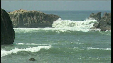 Beach ocean waves stones Stock Footage