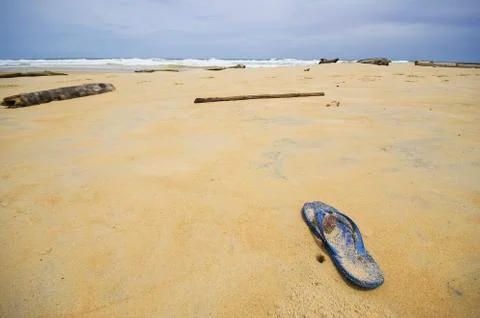 The beach with one flip flop Stock Photos