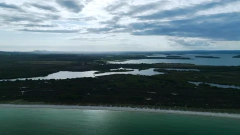 Beach over Studland and Godlingston Heath National Nature Reserve from a drone Video stock 280545526