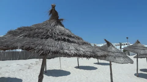 Beach parasol moves in the wind 03 Stock Footage 58921794