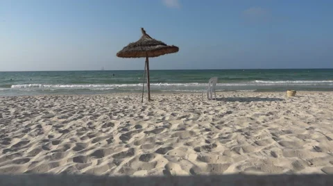 Beach parasol moves in the wind 04 Stock Footage 58922845