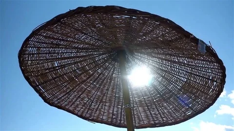 Beach parasol moves in the wind Stock Footage 83503528