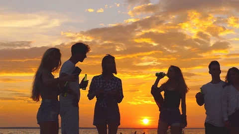 Beach party dancing. Slow-motion shooting. Stock Footage 94057174