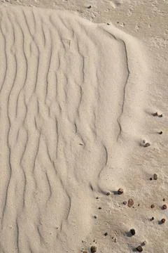 Beach pattern at the Baltic Sea Small sand waves create a pattern, the wav... Stock Photos