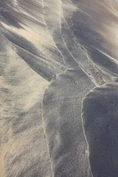 Beach pattern by waves on sand Foto stock