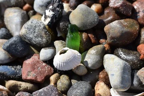 Beach pebble background texture macro Stock Photos