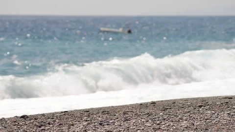 Beach with pebbles and waves in late summer Video stock 121088174