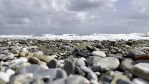 Beach Pebbles Sand and Waves Stock Footage 180704150