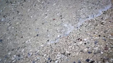 Beach Pebbles Shore Waves. Slow Motion Walk along Stock Footage 99567456